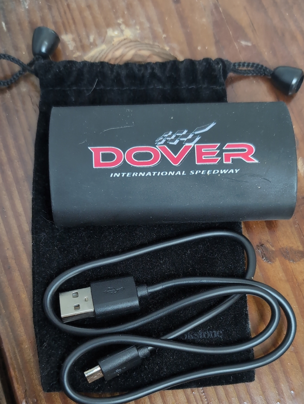 Brookstone Dover International Speedway Portable Power Bank with USB Cable + Bag
